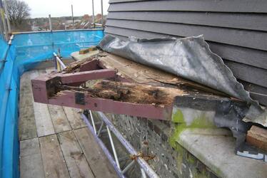 Photograph showing rotting reef deck before restoration. Photograph showing rotting reef deck before restoration.